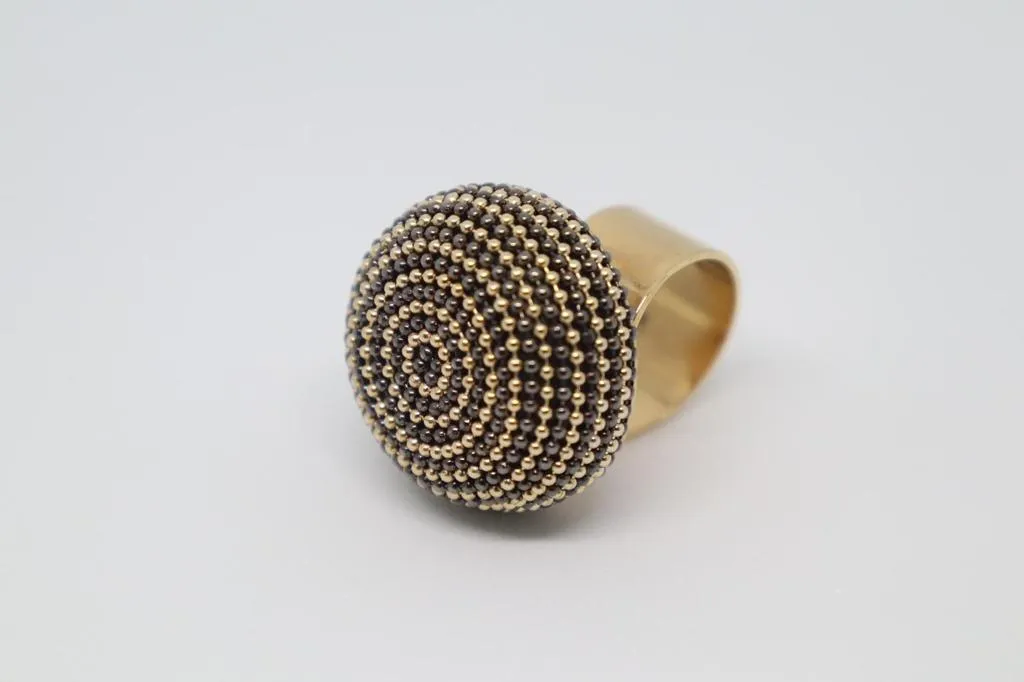 B.E. BLACK AND GOLD ROUND RING