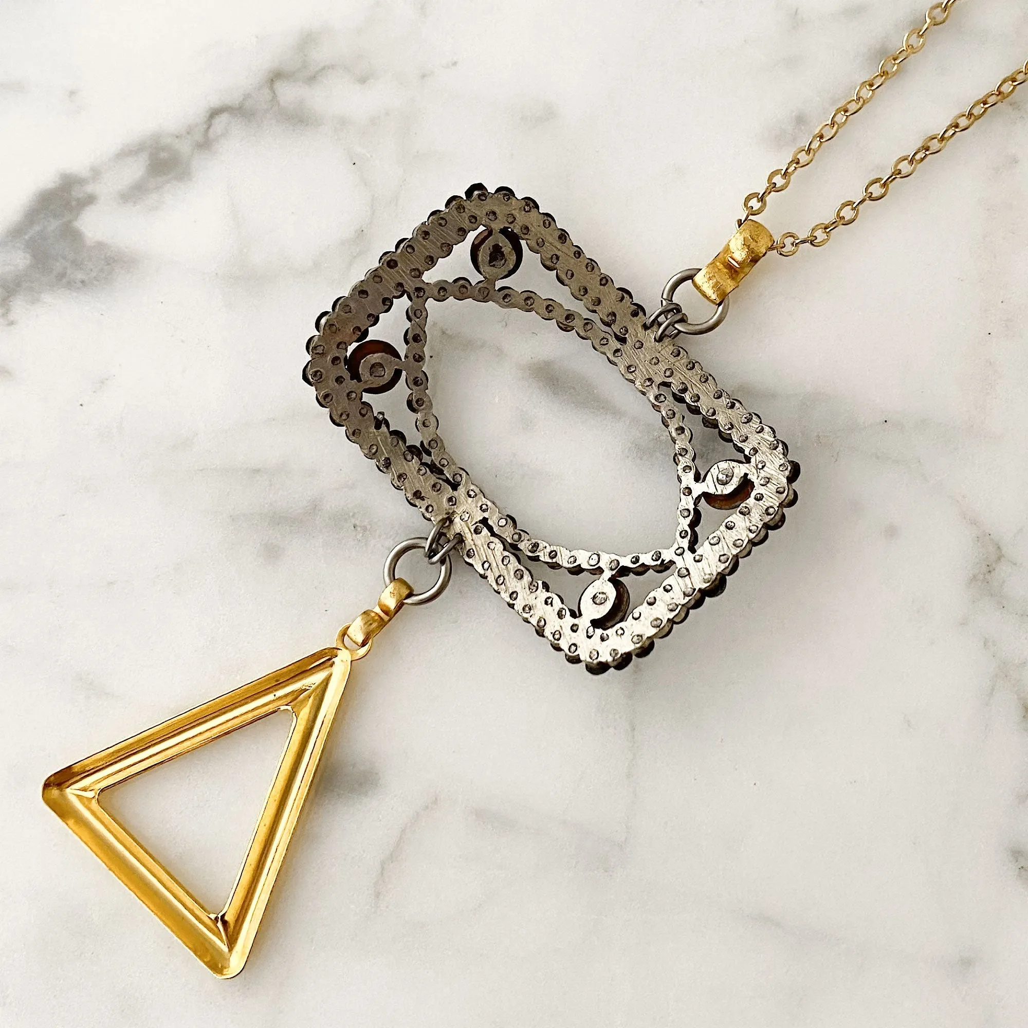 LAKOTA steel buckle and gold triangle necklace