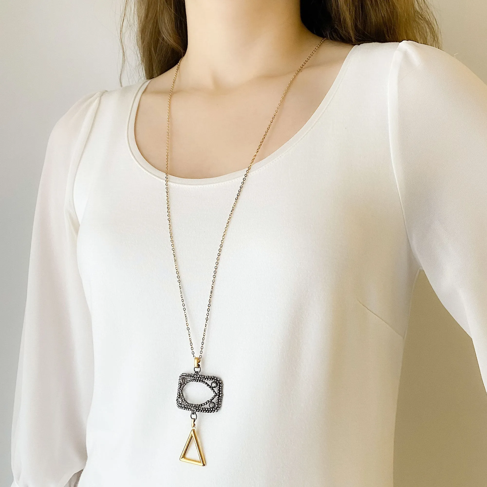 LAKOTA steel buckle and gold triangle necklace