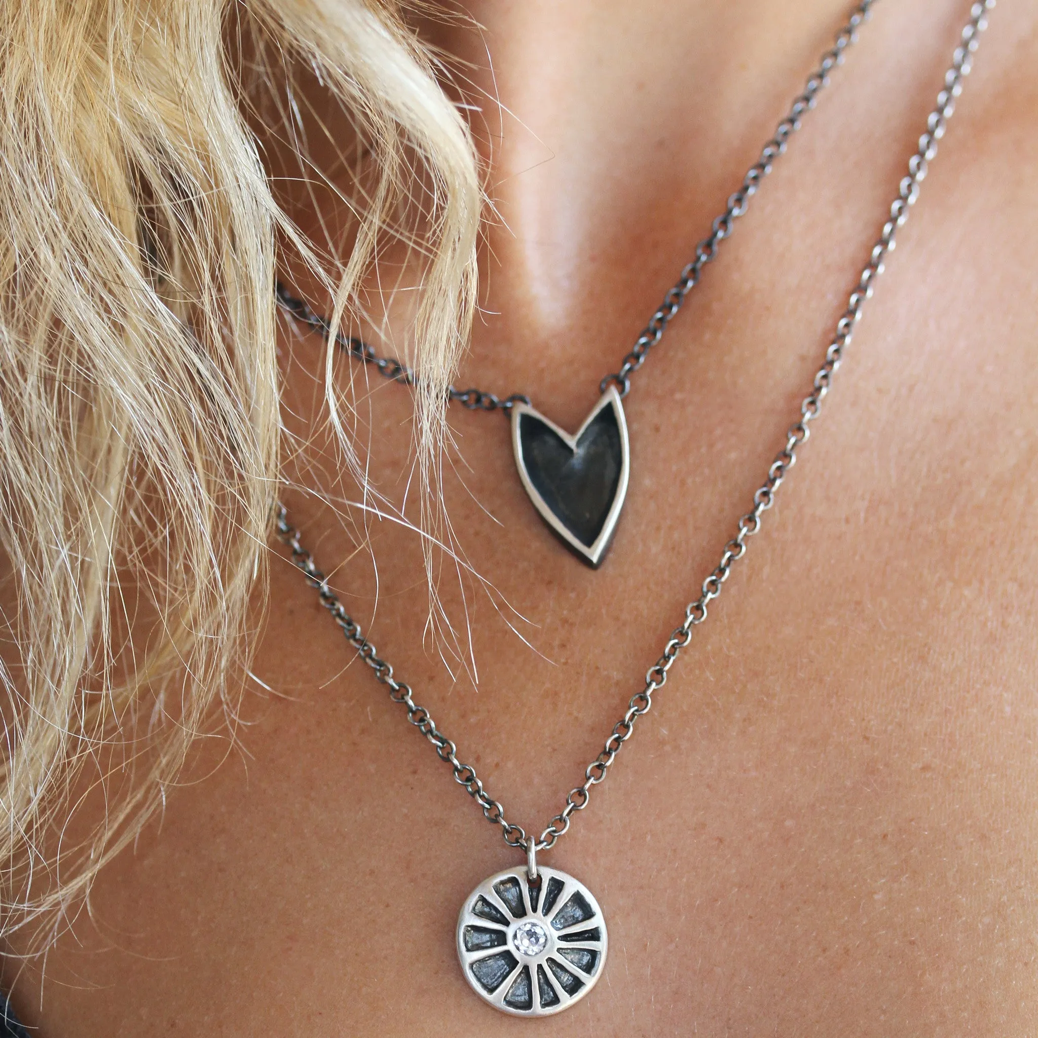 Shielded heart necklace