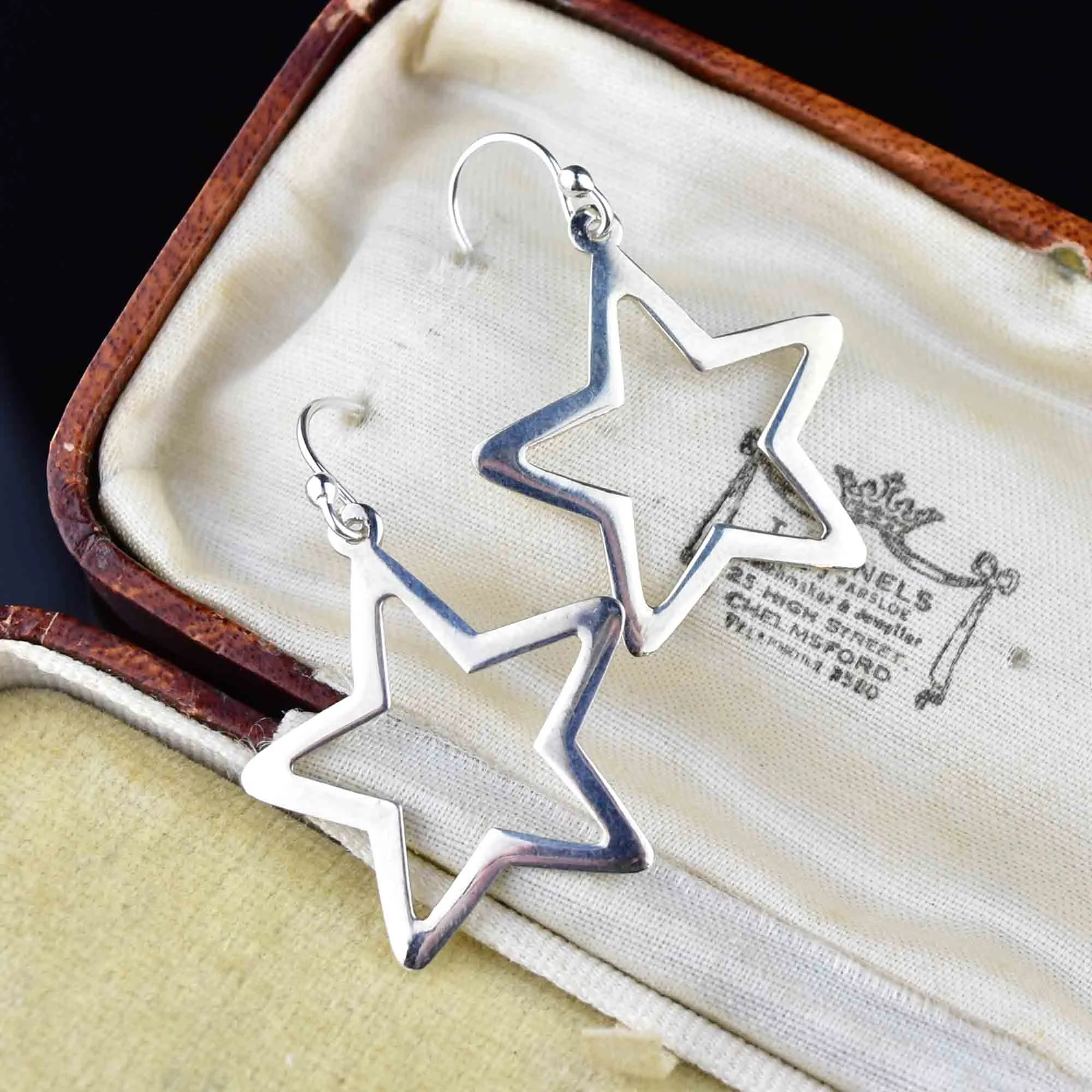 Sterling Silver Star Cutout Dangle Earrings